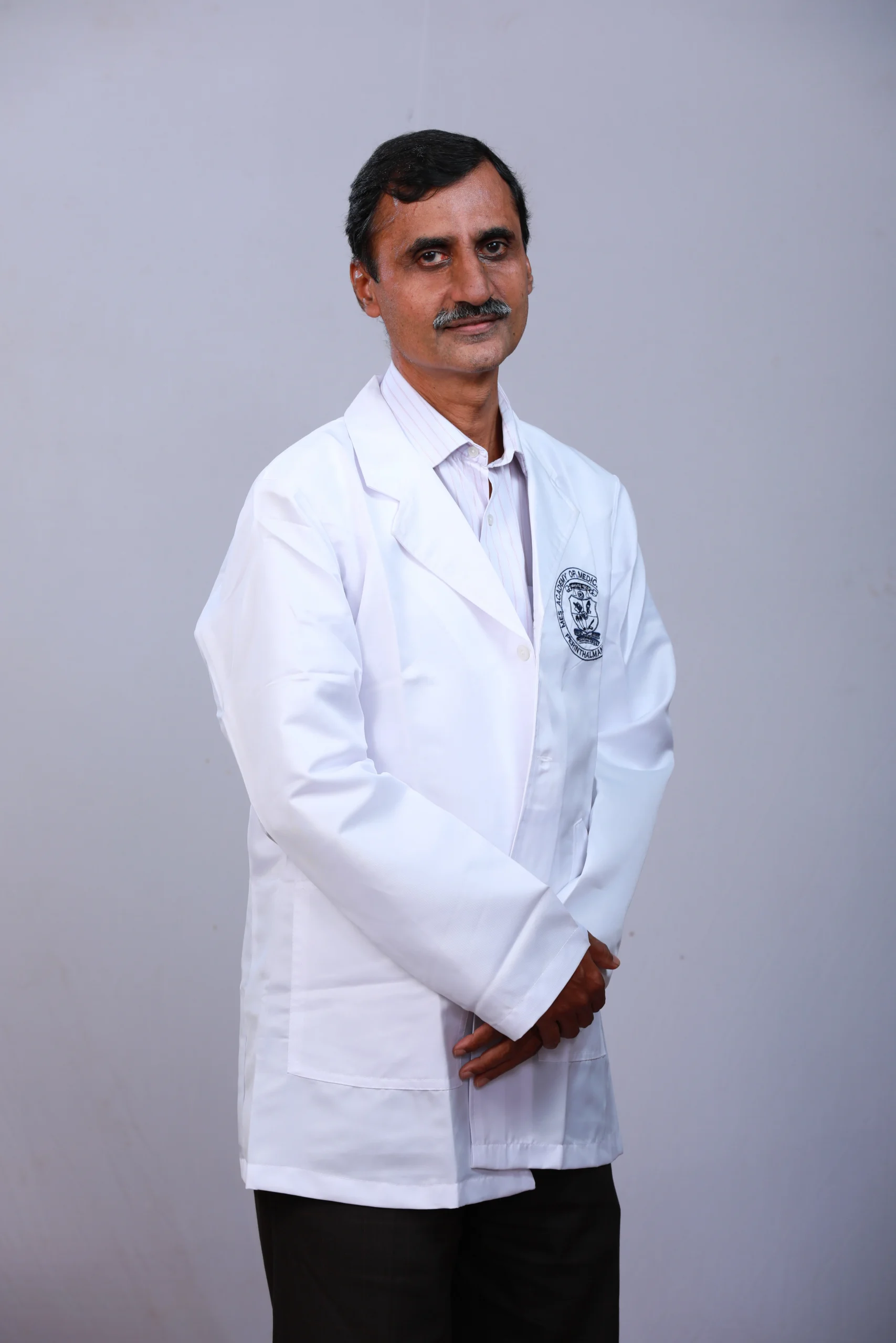 Dr. Feroze M