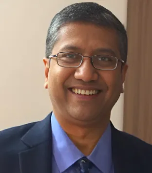 Dr. Girish Raj